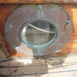 The Portholes were fitted before the coaming.